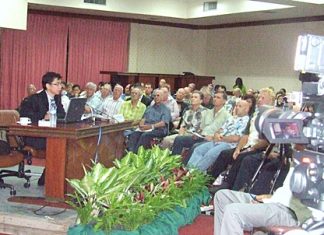 Chief Justice Visit Sriphibun addresses a gathering of expats, explaining some of the nuances of Thai law.